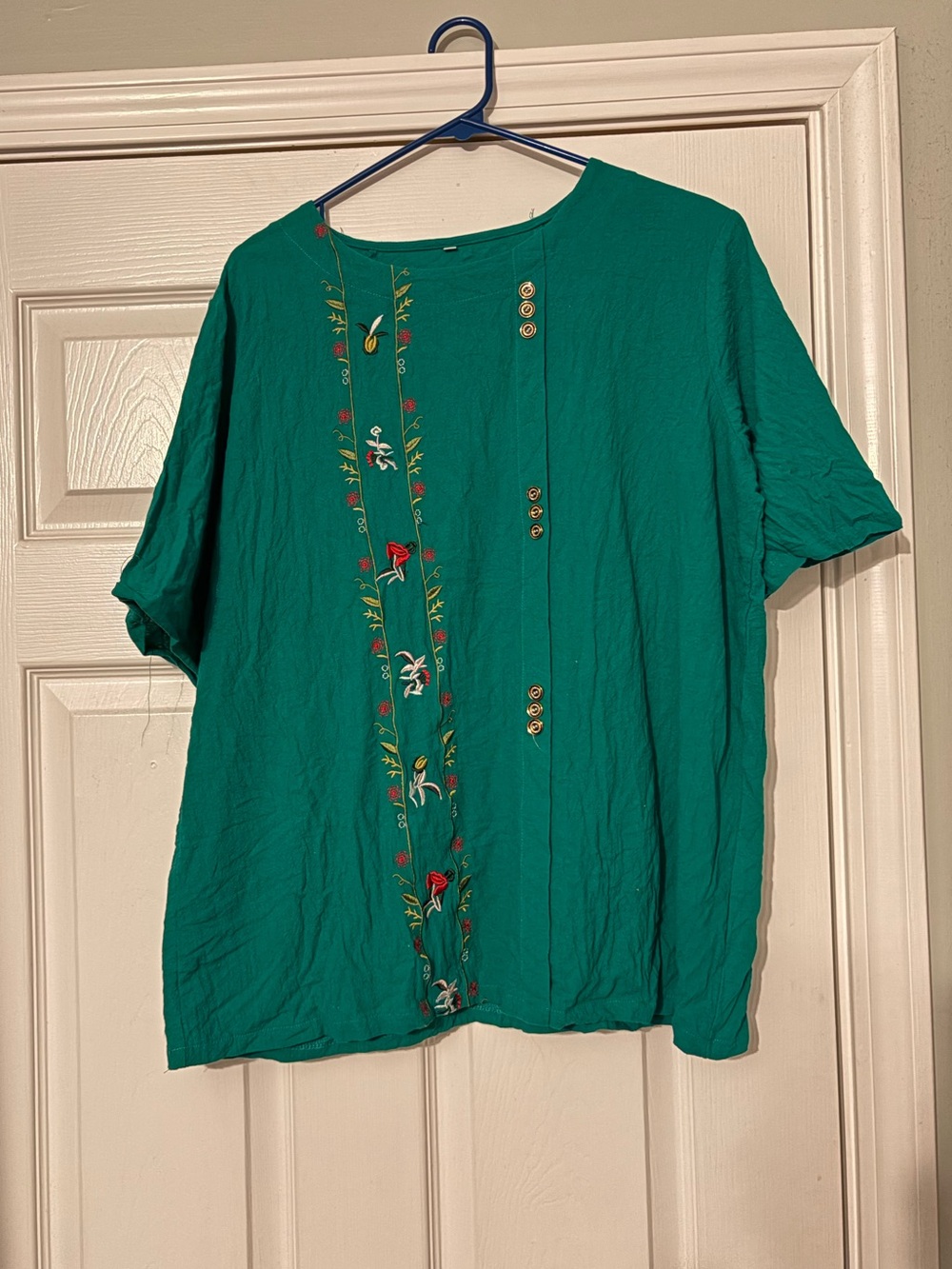 Green embroidered shirt